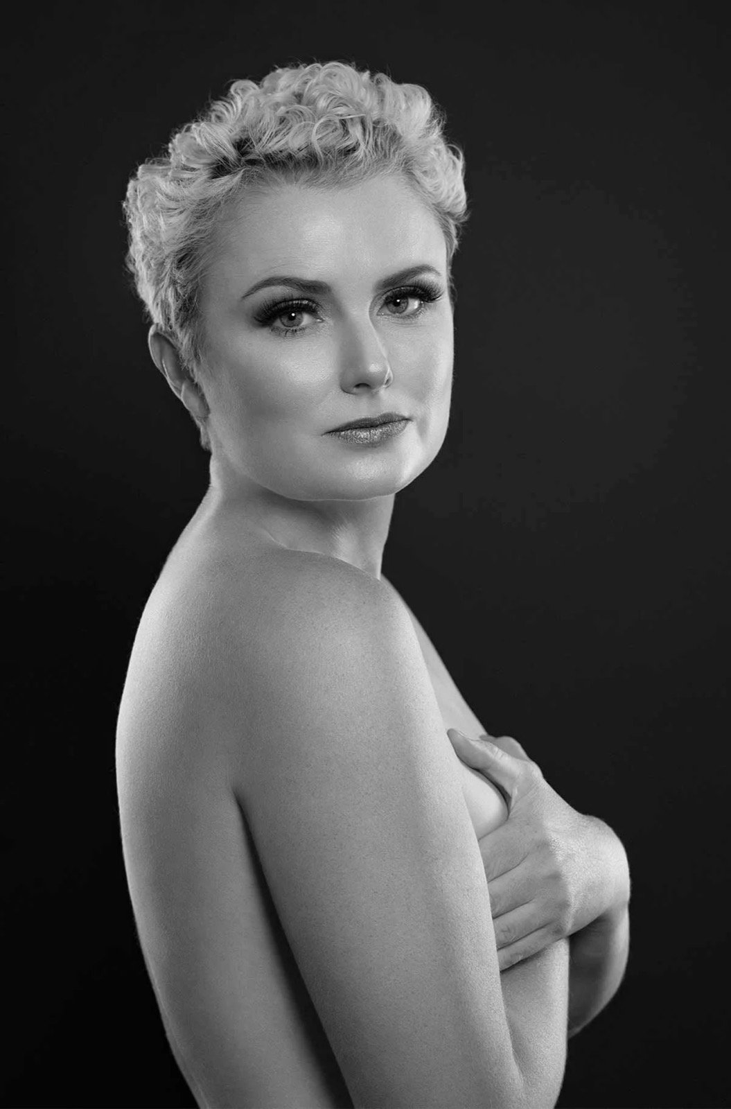 Black and white studio boudoir portrait